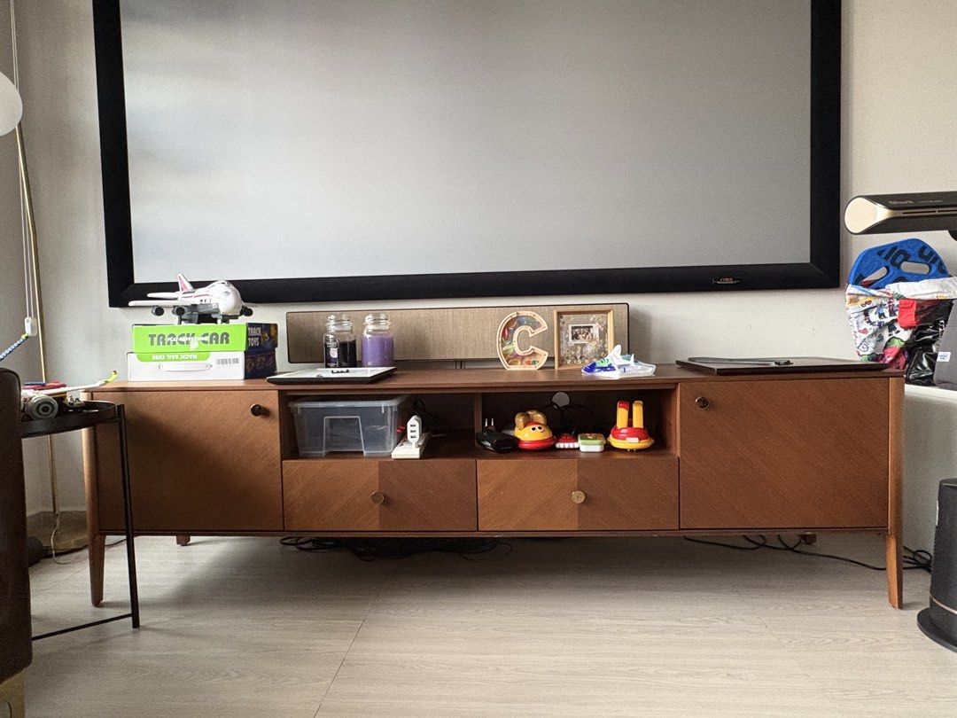 Mid-Century Modern TV Console (Category: TV Consoles) located in Singapore. Submitted by joel.koh.167 (Listing ID 1428510994, Image 2). Description: Castlery solid wood TV console Still functional and is long lasting due to its solid wood material Would spruce up your living room and has multiple storage spaces Need to arrange for delivery as it is quite heavy.