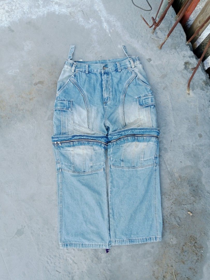 MUYI Detachable Jeans - Size 36 (Category: Jeans) located in Tanza. Submitted by llcoolj. (Listing ID 1428446205, Image 2). Description: Stylish detachable jeans from MUYI. Features a light blue wash and cargo pockets. The jeans can be converted into shorts. Size 36. Includes original tags. Made in Guangzhou, China. The jeans have a unique design with a zip-off feature, allowing for versatile wear. Perfect for a casual and trendy look..