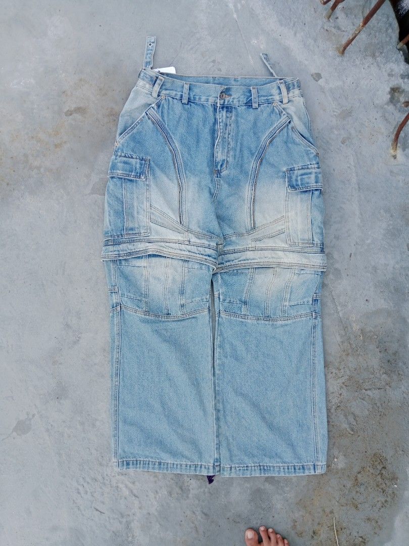 MUYI Detachable Jeans - Size 36 (Category: Jeans) located in Tanza. Submitted by llcoolj. (Listing ID 1428446205, Image 1). Description: Stylish detachable jeans from MUYI. Features a light blue wash and cargo pockets. The jeans can be converted into shorts. Size 36. Includes original tags. Made in Guangzhou, China. The jeans have a unique design with a zip-off feature, allowing for versatile wear. Perfect for a casual and trendy look..