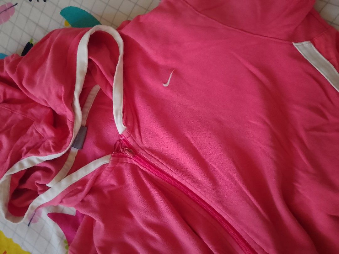 Nike Pink Zip-Up Hoodie (Category: Coats, Jackets and Outerwear) located in Quezon City. Submitted by mommagecko (Listing ID 1428502842, Image 3). Description: Nike Pink fits M to L ships thru J&T 📍Quezon City.