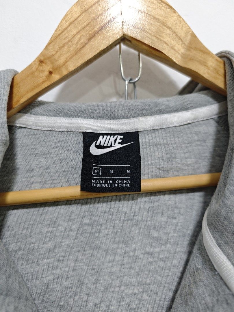 Nike tech fleece Gray Hoodie Jacket - Medium (Category: Coats, Jackets and Outerwear) located in Bulacan. Submitted by pzj_thrift (Listing ID 1428474613, Image 3). Description: L 22 W 20 Condition 9/10 Color rate 9.5/10 Issue small stain .