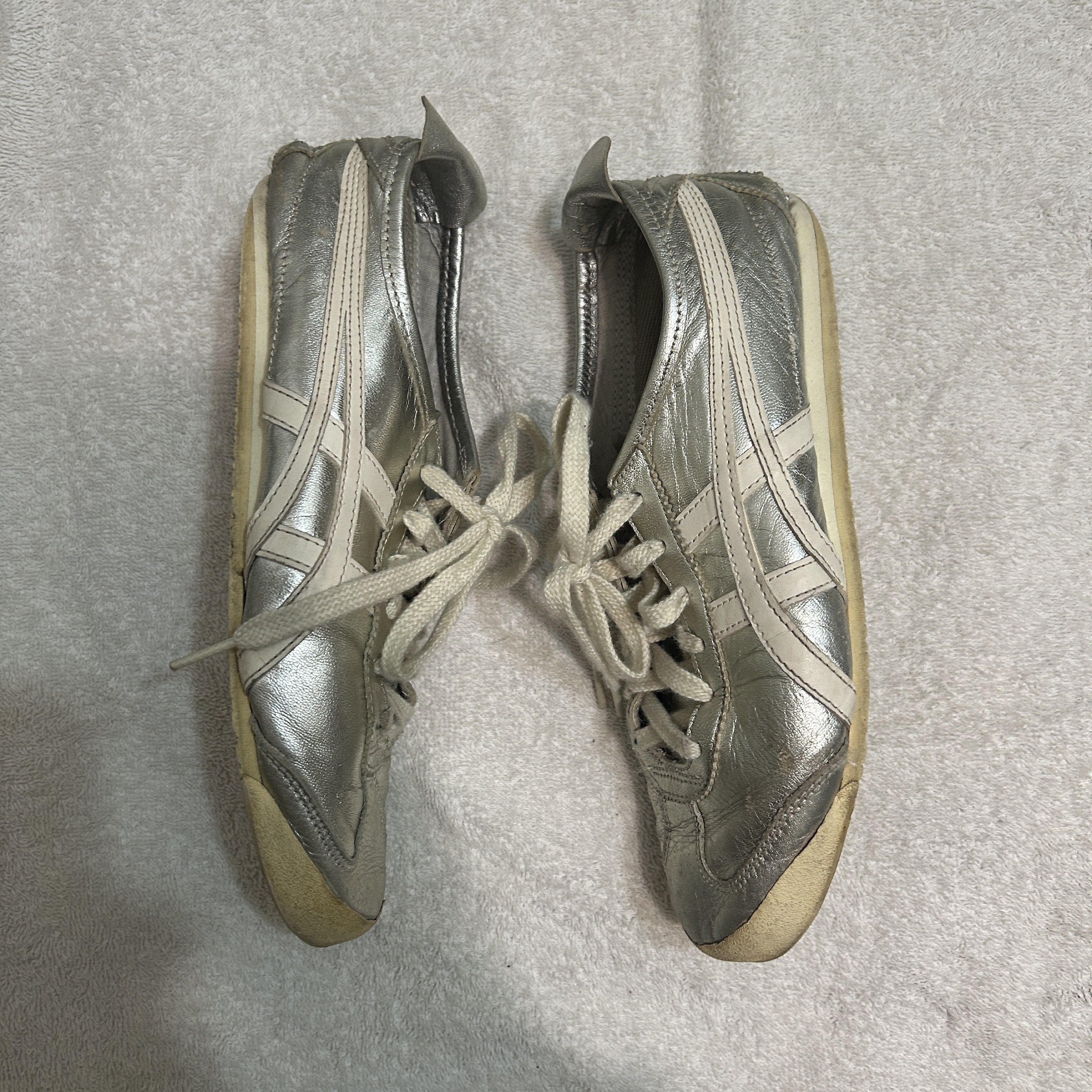Onitsuka Tiger Mexico 66 Silver Sneakers (Category: Sneakers) located in Manila. Submitted by a.saimonnnnn (Listing ID 1428575511, Image 3). Description: Silver Onitsuka Tiger Mexico 66 sneakers. Features the iconic tiger stripes in white. The size is 25.0 cm / US 6.5 / EUR 38.5. The shoes have white laces. See pics for flaws authenticity not guaranteed .
