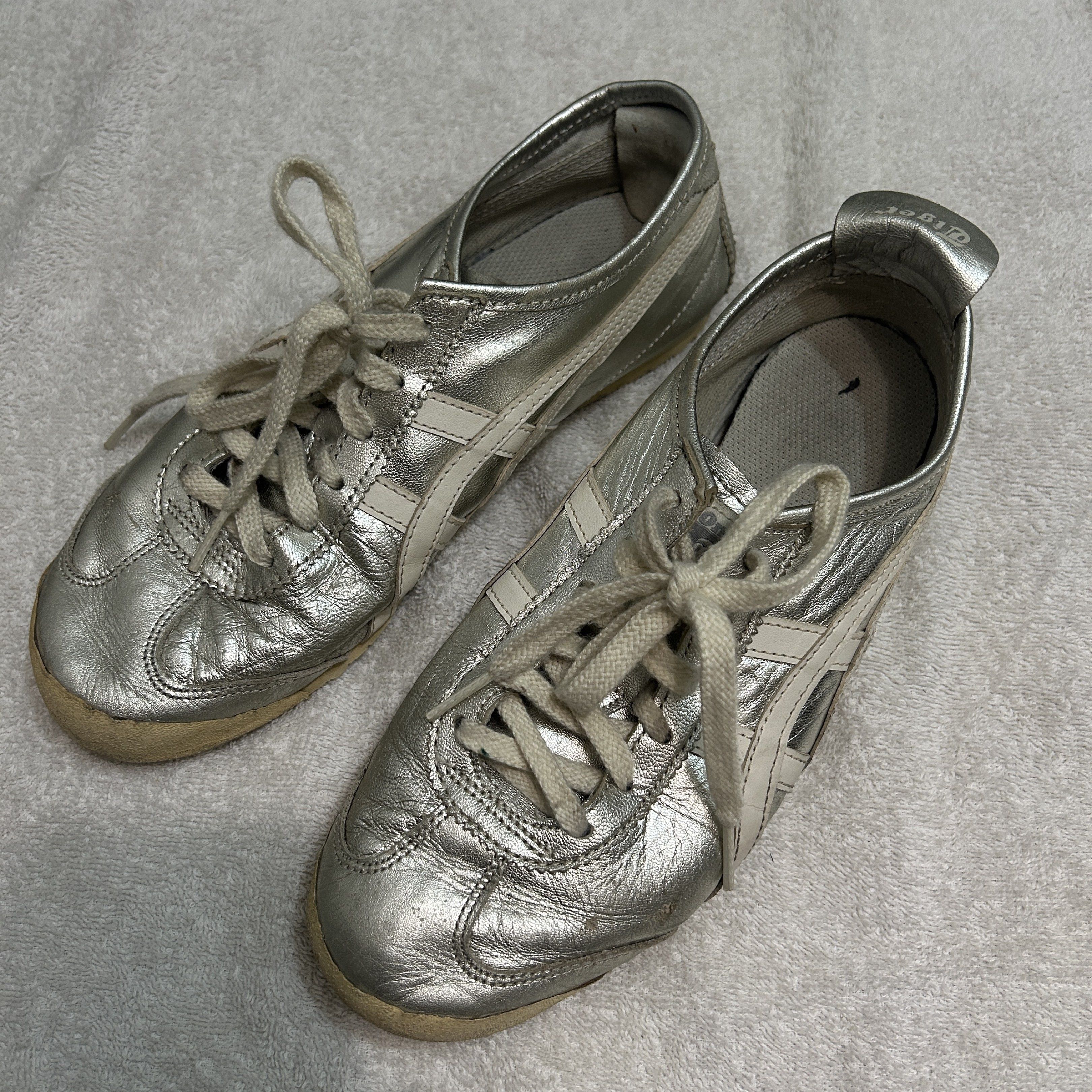 Onitsuka Tiger Mexico 66 Silver Sneakers (Category: Sneakers) located in Manila. Submitted by a.saimonnnnn (Listing ID 1428575511, Image 2). Description: Silver Onitsuka Tiger Mexico 66 sneakers. Features the iconic tiger stripes in white. The size is 25.0 cm / US 6.5 / EUR 38.5. The shoes have white laces. See pics for flaws authenticity not guaranteed .