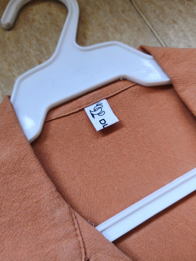 Orange Short-Sleeved Polo w/ orange patch (Category: Shirts) located in Manila. Submitted by aaa_sy (Listing ID 1428440539, Image 2). Description: thin linen texture good for summer outfits rfs: don't wear anymore no flaws.