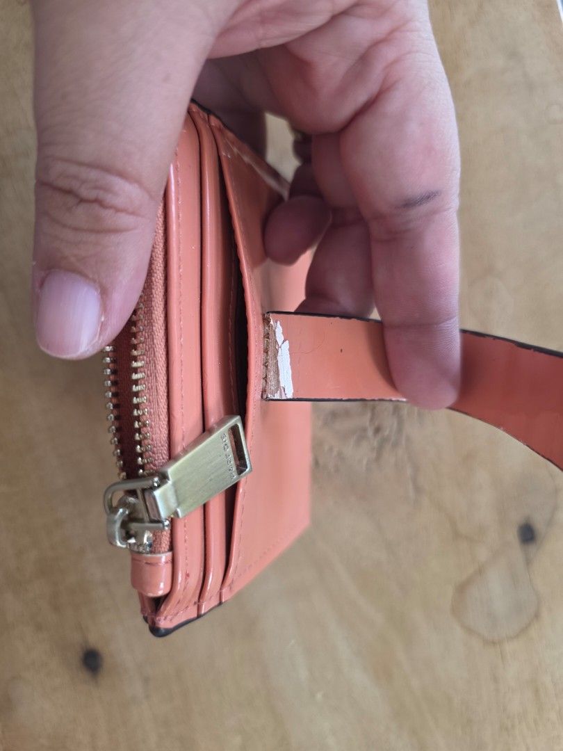 Peach-colored Card Wallet with Zipper (Category: Wallets & Card holders) located in Cebu City. Submitted by mtdsala (Listing ID 1428578154, Image 2). Description: Decluttering. Fairly used with signs of usage..