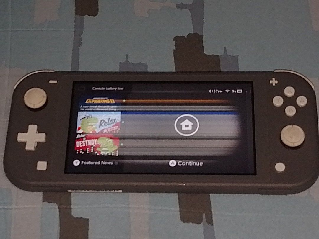 (PLEASE READ!) Nintendo Switch Lite Grey (FOR PARTS?) (AS-IS) (Category: Nintendo) located in Mainit. Submitted by davidkritz76401 (Listing ID 1428557501, Image 2). Description: (UNAVAILABLE UNTIL FUTHER NOTICE. UNFORTUNATELY, SINCE I MOVED OUT FROM THE PROVINCE I WASN'T ABLE TO BRING THIS WITH ME DUE TO WEIGHT AND LOGISTICS PROBLEMS. I DEEPLY APOLOGIZE.) Switch Lite in Grey. It still turns on and the controls are almost fully working except for 
