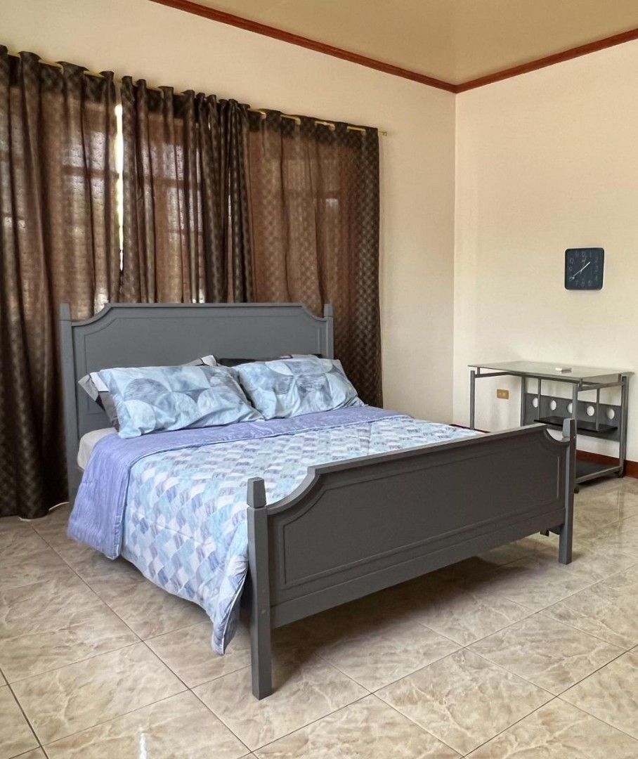 Wooden Queen Bed Frame (No Mattress) (Category: Bed Frames & Mattresses) located in San Juan City. Submitted by onlinecabinet (Listing ID 1428590961, Image 1). Description: Queen Bed Frame - Solid wood - In good used condition - Mattress excluded - Has small crack but does not affect function Measurement, more pictures other details can be shared upon request. Pick-up in San Juan, Metro Manila.