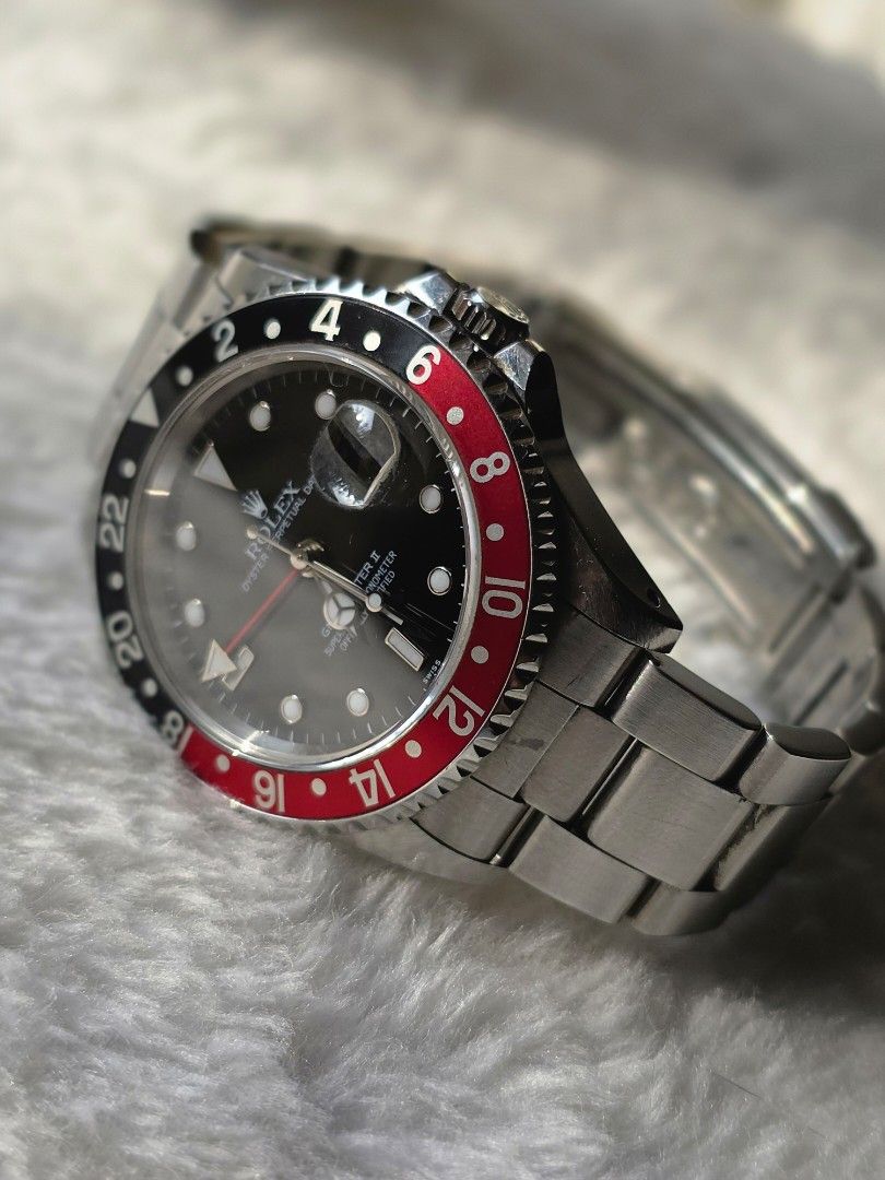 Rolex GMT-Master Coke (Category: Luxury Watches) located in Las Pinas. Submitted by arjayonly (Listing ID 1428501847, Image 2). Description: 16710 "Coke." Differ from the modern ceramic models, aluminum bezel and slim lugs of the Neo-Vintage era offer the best wrist presence. ​MODEL: 16710 (Z-Serial/Stick Dial vibe)​ CONDITION: Beautifully preserved. Lugs are still thick and sharp, and not polished like most examples you see today. ​BEZEL: Origin