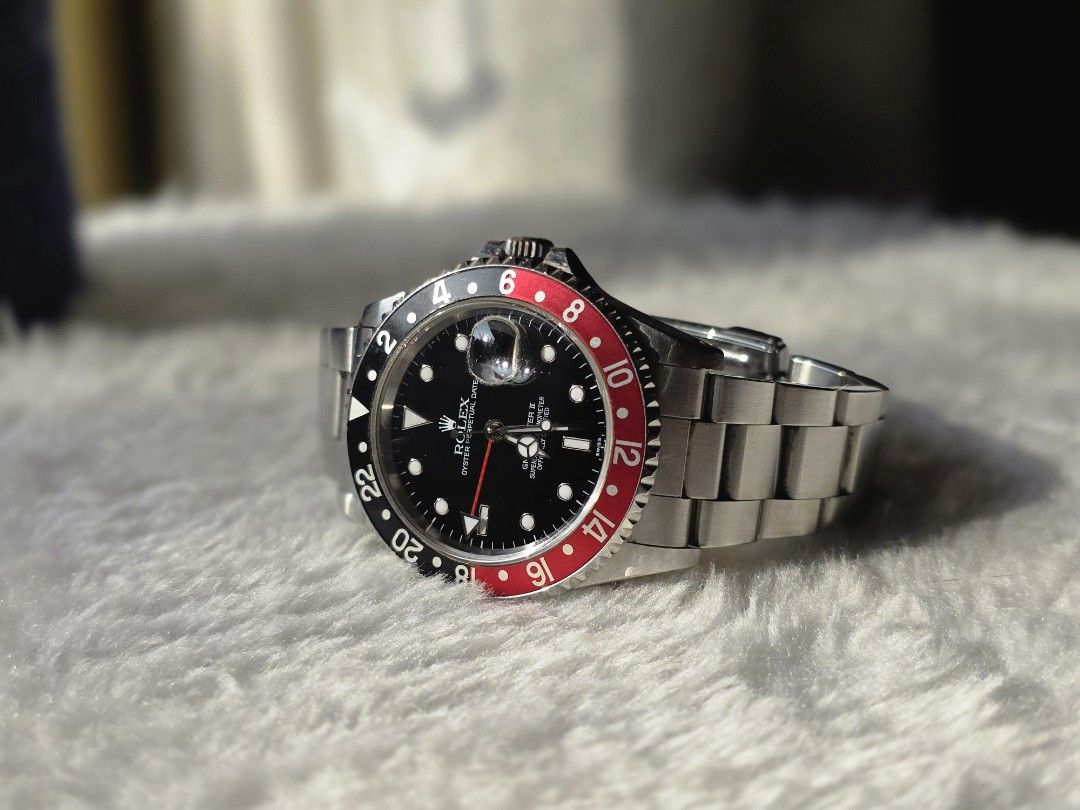 Rolex GMT-Master Coke (Category: Luxury Watches) located in Las Pinas. Submitted by arjayonly (Listing ID 1428501847, Image 1). Description: 16710 "Coke." Differ from the modern ceramic models, aluminum bezel and slim lugs of the Neo-Vintage era offer the best wrist presence. ​MODEL: 16710 (Z-Serial/Stick Dial vibe)​ CONDITION: Beautifully preserved. Lugs are still thick and sharp, and not polished like most examples you see today. ​BEZEL: Origin