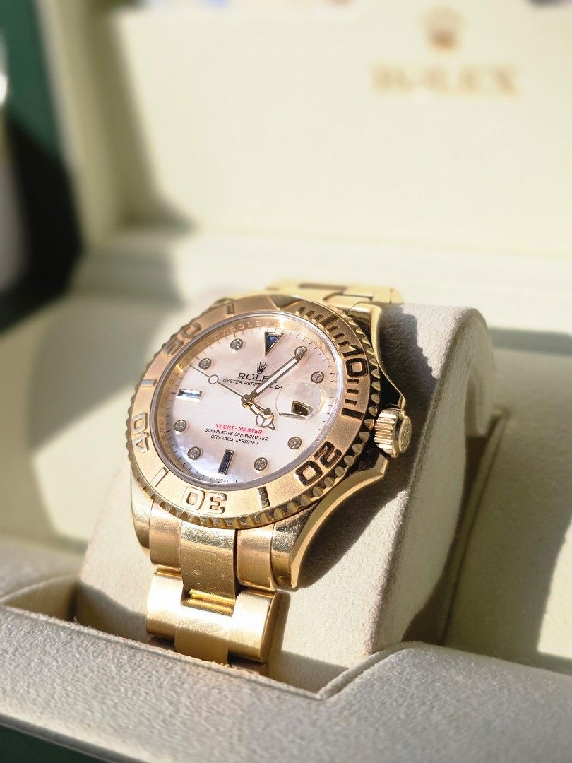 Rolex Yacht-Master Gold Watch (Category: Luxury Watches) located in Las Pinas. Submitted by arjayonly (Listing ID 1428496783, Image 1). Description: Ref. 16628 Yacht-Master in solid 18k Yellow Gold, Factory Mother of Pearl dial with Sapphire and Diamond "Serti" markers. ​This isn't standard configuration, the MOP dial has incredible natural iridescence that must be seen in person to be appreciated. ​CONDITION: Excellent. Sharp case lines, crisp b