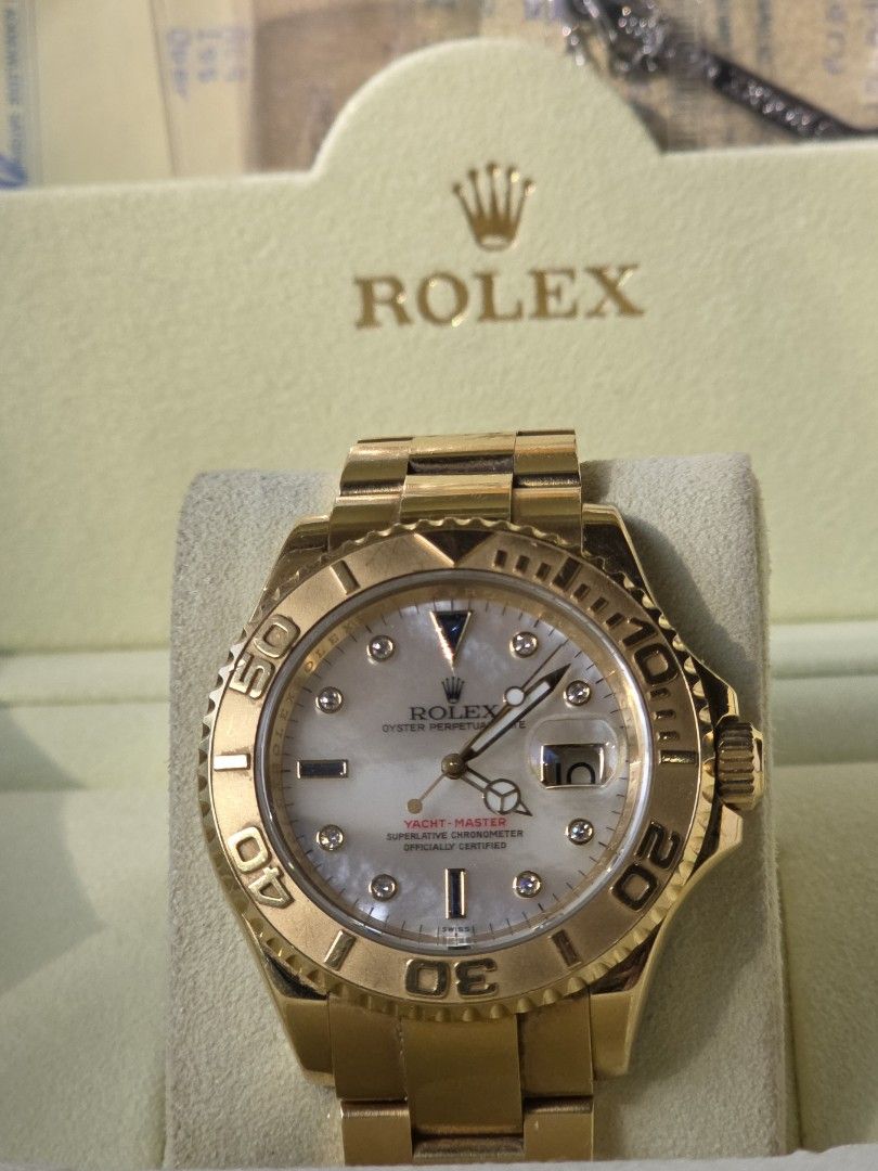 Rolex Yacht-Master Gold Watch (Category: Luxury Watches) located in Las Pinas. Submitted by arjayonly (Listing ID 1428496783, Image 2). Description: Ref. 16628 Yacht-Master in solid 18k Yellow Gold, Factory Mother of Pearl dial with Sapphire and Diamond "Serti" markers. ​This isn't standard configuration, the MOP dial has incredible natural iridescence that must be seen in person to be appreciated. ​CONDITION: Excellent. Sharp case lines, crisp b