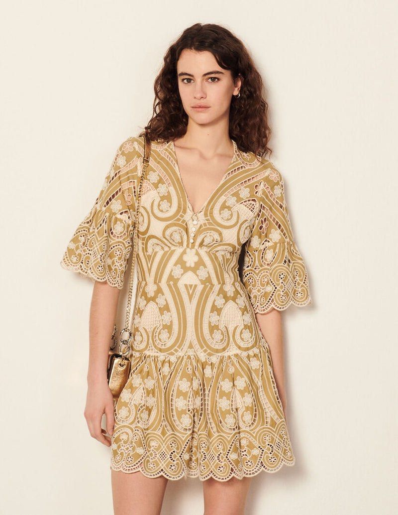 Sandro Embroidered Green Mini Dress (Category: Dresses) located in Manila. Submitted by declutterwithC (Listing ID 1428483673, Image 2). Description: Size: Medium to Large Beautiful Sandro inspire mini dress featuring intricate embroidery and a flattering V-neckline. It has elegant bell sleeves and a fitted waist that flows into a tiered skirt. The dress is adorned with delicate floral and paisley patterns. It has a button-down front and a scallo