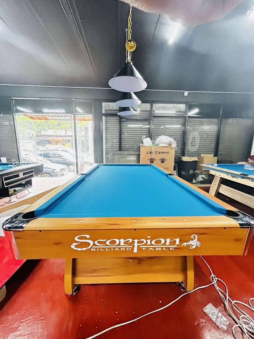 SCORPION BROWN BILLIARD TABLE (Category: Everything Else Others) located in San Pablo. Submitted by vennisa.sportssupplies (Listing ID 1428483649, Image 3). Description: SCORPION BROWN BILLIARD TABLE Php65,000 ✅ Specification: ✔ Size: 5x9ft (Tournament) ✔ Slate: Granite ✔ Rails: MDF (medium density fiber-board) ✔ Cushion: Master Banda ✔ Corner&Side Pocket Cover: Metal ✔ Pocket: Manual ✅ Accessories Included: ✔ K-66 Banda ✔ Billiard Cloth ✔ White 