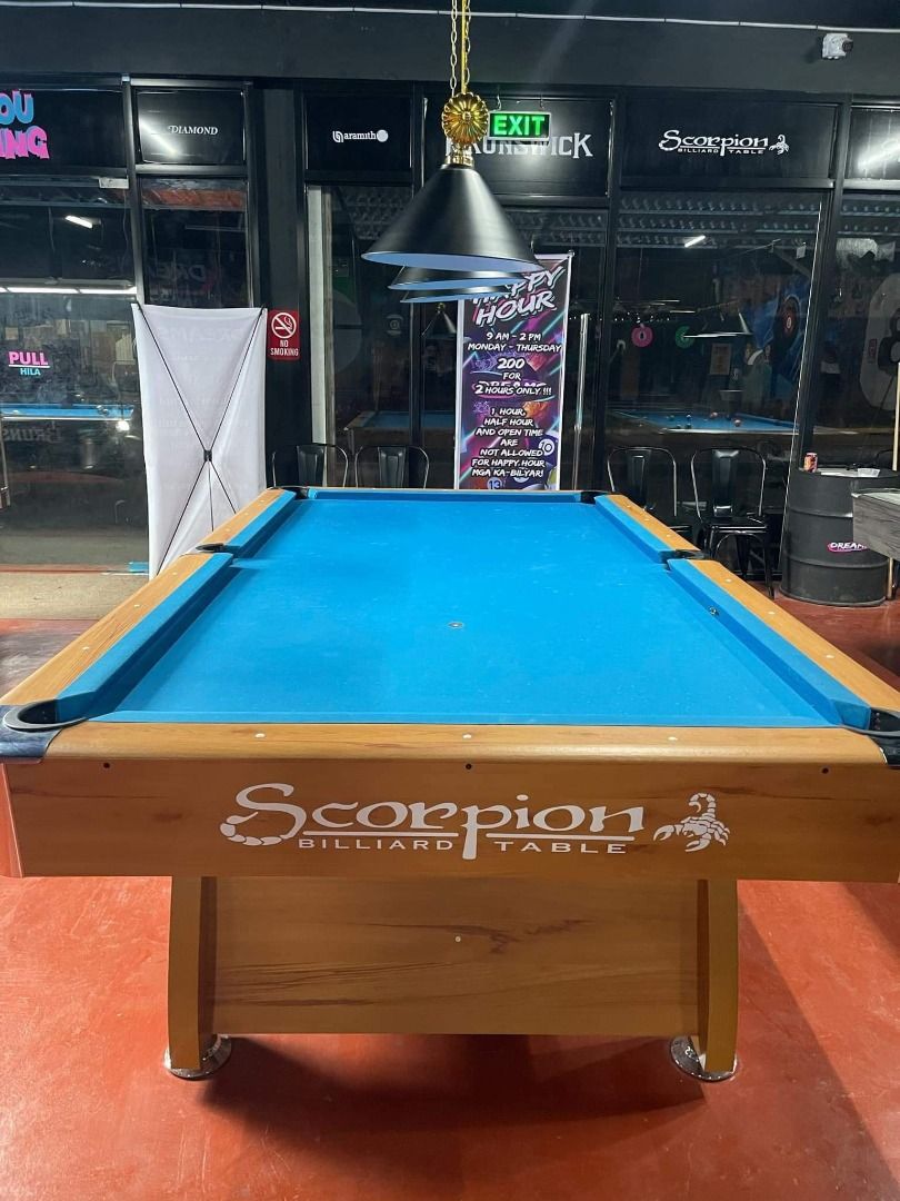 SCORPION BROWN BILLIARD TABLE (Category: Everything Else Others) located in San Pablo. Submitted by vennisa.sportssupplies (Listing ID 1428483649, Image 2). Description: SCORPION BROWN BILLIARD TABLE Php65,000 ✅ Specification: ✔ Size: 5x9ft (Tournament) ✔ Slate: Granite ✔ Rails: MDF (medium density fiber-board) ✔ Cushion: Master Banda ✔ Corner&Side Pocket Cover: Metal ✔ Pocket: Manual ✅ Accessories Included: ✔ K-66 Banda ✔ Billiard Cloth ✔ White 