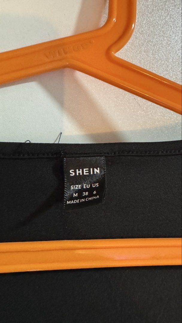 SHEIN Black Bodysuit with Bell Sleeves Plus Size (Category: Others Tops) located in Pasig City. Submitted by gbrllsph (Listing ID 1428595124, Image 2). Description: Medium seen on tag but can fit 3XL-5XL. Never used, fitted twice pero sobrang laki kasi talaga. Plus size talaga. Nice quality! Stretchy, comfortable fabric and snap closure at the bottom.