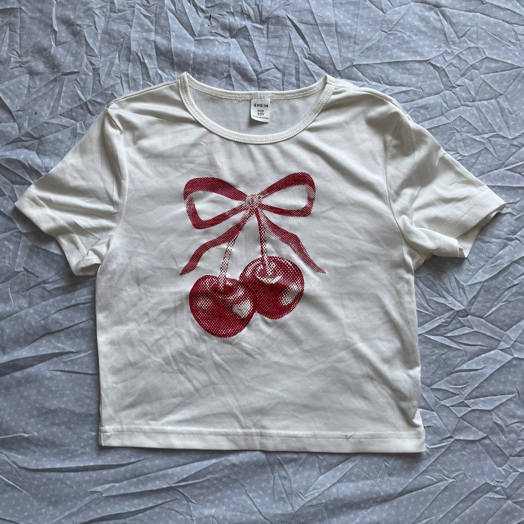Shein Cherry Print Crop Top XS-S (Category: Shirts) located in Rizal. Submitted by ksbentables (Listing ID 1428453326, Image 1). Description: - Shein Cherry Print Crop Top - Size: XS-S - Features a charming cherry print - Ideal for casual wear mop: maribank only! loc: cainta, rizal pay now, ship tom via jnt express color may vary depending on the lighting.