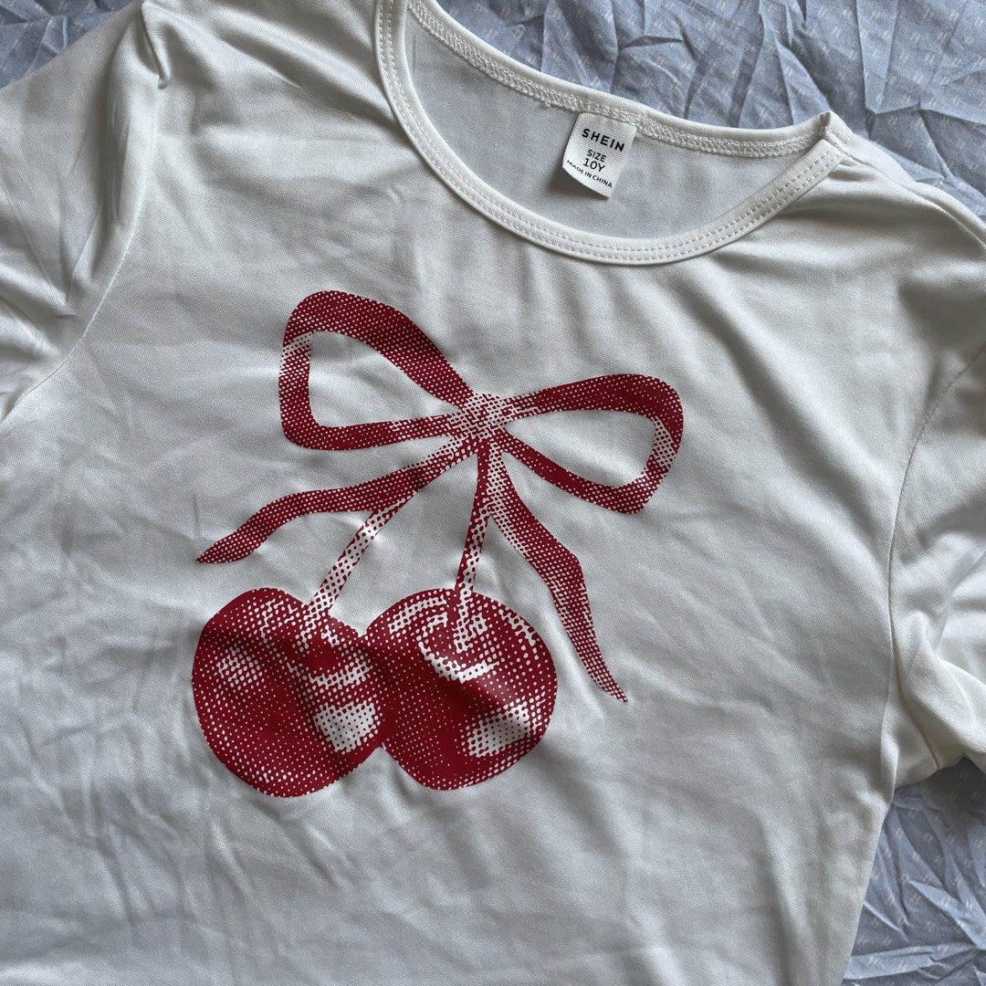 Shein Cherry Print Crop Top XS-S (Category: Shirts) located in Rizal. Submitted by ksbentables (Listing ID 1428453326, Image 2). Description: - Shein Cherry Print Crop Top - Size: XS-S - Features a charming cherry print - Ideal for casual wear mop: maribank only! loc: cainta, rizal pay now, ship tom via jnt express color may vary depending on the lighting.