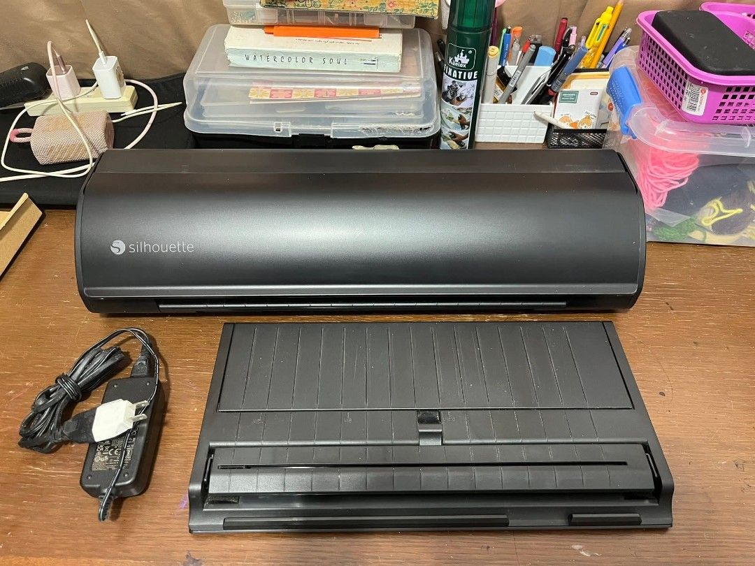 Silhouette Cameo 5 Electronic Cutting Machine (Category: Office & Business Technology) located in Manila. Submitted by alyssamae01 (Listing ID 1428468314, Image 3). Description: FS: Cameo 5 (black) Slightly used. Good as new. RFS: change of interest Orig price: 33k Selling for 20k (Negotiable) Location: Amadeo, Cavite .