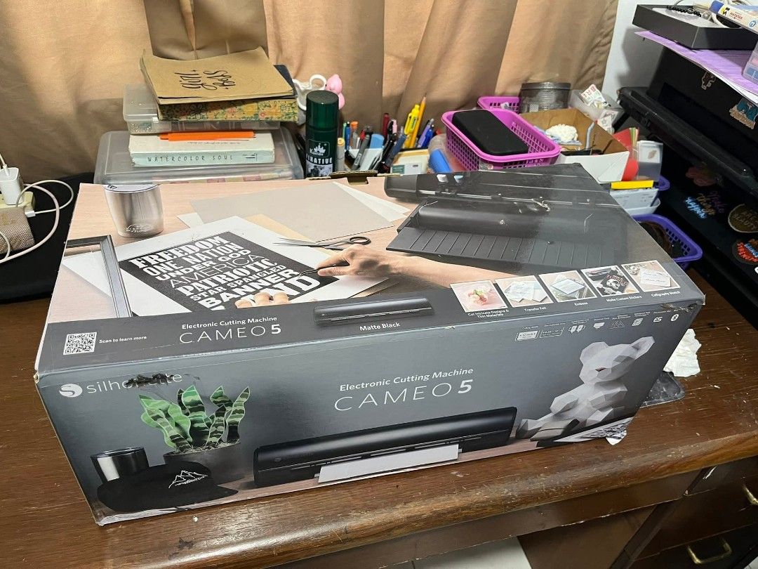Silhouette Cameo 5 Electronic Cutting Machine (Category: Office & Business Technology) located in Manila. Submitted by alyssamae01 (Listing ID 1428468314, Image 1). Description: FS: Cameo 5 (black) Slightly used. Good as new. RFS: change of interest Orig price: 33k Selling for 20k (Negotiable) Location: Amadeo, Cavite .