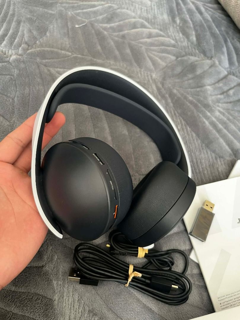 Sony PS5 PlayStation 5 Pulse 3D Headphones (Category: Headphones & Headsets) located in Manila. Submitted by grnickkk (Listing ID 1428481950, Image 2). Description: - 100% Original and Working - Never used - Bought from Saudi - Comes with a box, but it has damage, but it's not that severe - Includes manual, audio jacks, and charging cable Includes a Sony PlayStation 5 wireless headset, USB adapter, USB-C charging cable, 3.5mm audio cable, and doc