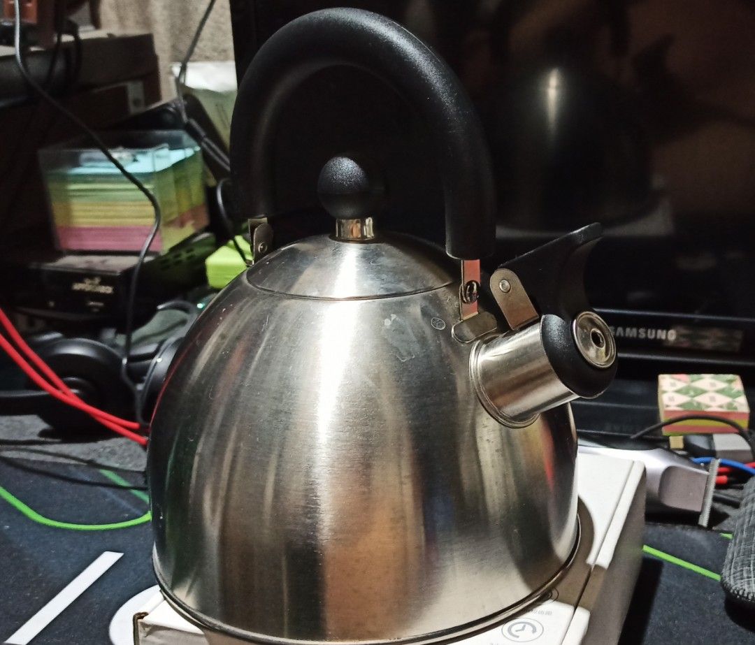 Stainless Steel Kettle (Category: Kettles & Airpots) located in Makati City. Submitted by jerrymontano (Listing ID 1428449019, Image 2). Description: Stainless steel kettle features a black handle and a whistle. The kettle is a good size for making tea or coffee. It is a practical and stylish addition to any kitchen..