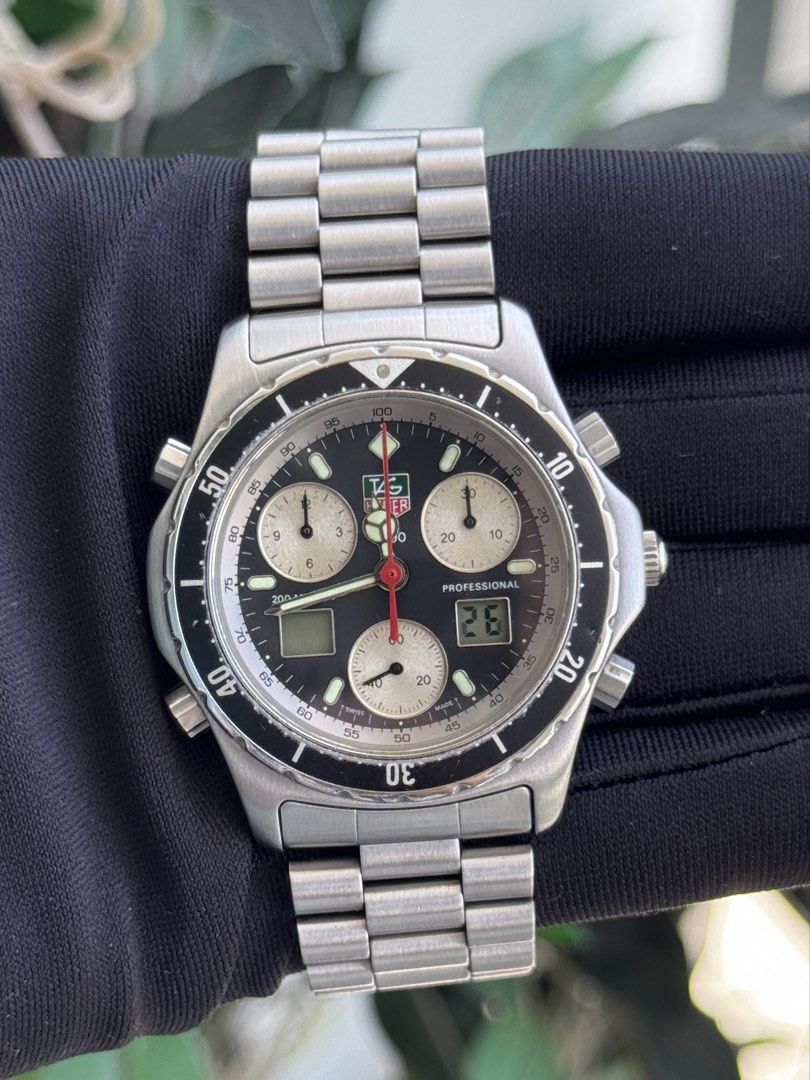 TAG Heuer Professional 1/10th Chronograph (Category: Luxury Watches) located in Quezon City. Submitted by mjgorobat15 (Listing ID 1428511970, Image 3). Description: TAG Heuer Professional 1/10th Chronograph •Reference No. 240.306 •Movement: Swiss Quartz Analog-Digital •Case diameter: 40mm •Sapphire Crystal •Rare Black Panda Dial with digital window •Wrist size up to 16cm •Inclusions: Tag Heuer Double Box •Condition: 9/10 newly serviced.