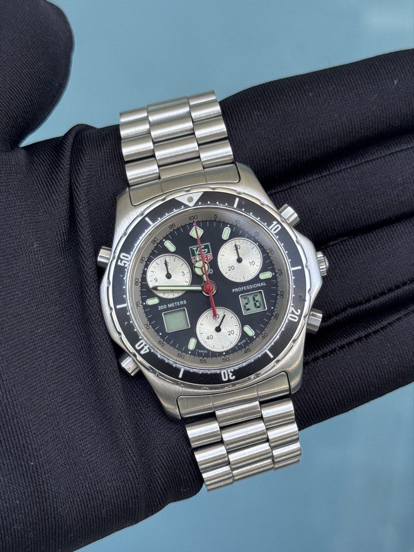 TAG Heuer Professional 1/10th Chronograph (Category: Luxury Watches) located in Quezon City. Submitted by mjgorobat15 (Listing ID 1428511970, Image 2). Description: TAG Heuer Professional 1/10th Chronograph •Reference No. 240.306 •Movement: Swiss Quartz Analog-Digital •Case diameter: 40mm •Sapphire Crystal •Rare Black Panda Dial with digital window •Wrist size up to 16cm •Inclusions: Tag Heuer Double Box •Condition: 9/10 newly serviced.