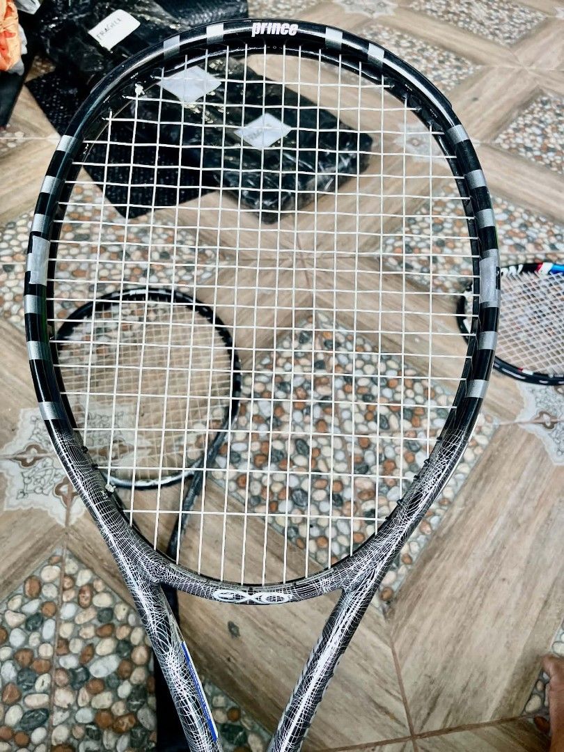 Twin Prince O3 Thunder White Tennis Rackets (Category: Racket and Ball Sports) located in Solano. Submitted by ahsef (Listing ID 1428568434, Image 3). Description: Twin Prince O3 Thunder White Tennis Rackets Headsize: 118 square inches Weight: 250 grams Grip no. 2 in very good condition no cracks just scratches but still presentable shipping via flash express payment via gcash price negotiable.