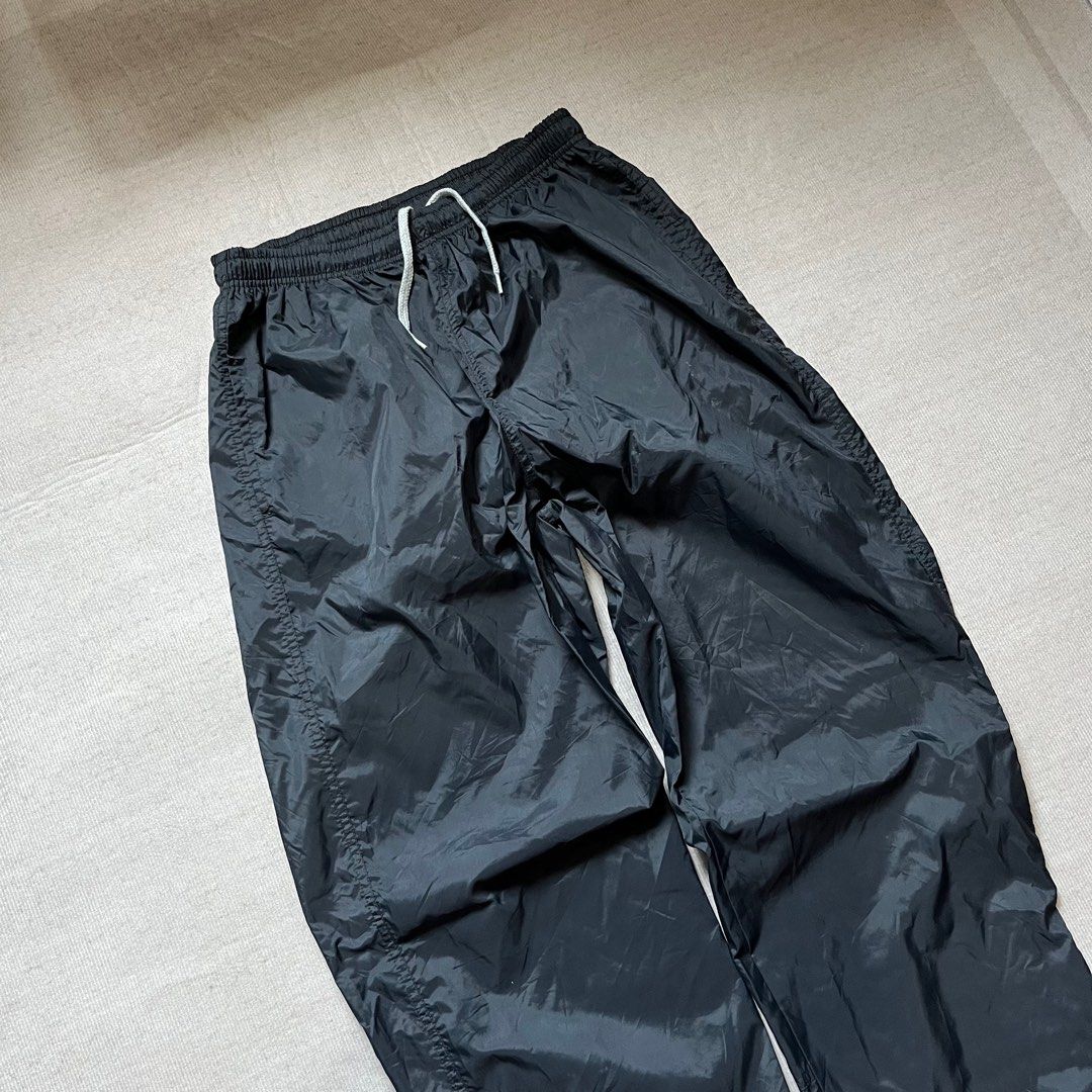 Vintage 1999 Black Nike Track Pants (Category: Joggers) located in Quezon City. Submitted by _daviddpintoo (Listing ID 1428450802, Image 3). Description: Vintage 1999 Black Ni/ke Track Pants (White Back Embroidered Swoosh) Excellent Condition -minor unnoticeable stains Waist: 28 to 36 inches adjustable with drawstring Length: 42 inches Thigh: 12 inches Leg Opening: 7 inches adjustable with ankle zip ₱750 +shipping fee NOTE: Color may vary due to 