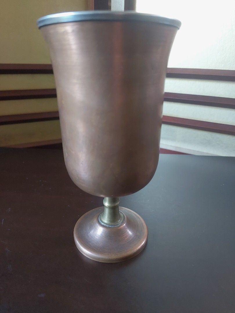 Vintage Copper Goblet with brass base (Category: Coffee & Tea Tableware) located in Bulacan. Submitted by hnbfinds (Listing ID 1428437945, Image 1). Description: The Ultimate Vintage Vibe: "Old-world charm meets modern hosting. ✨ There is nothing quite like the weight of a handcrafted copper goblet and the timeless contrast of a brass stem. Not only a statement piece for the bar cart, but the copper also keeps your drink icy cold from the first s