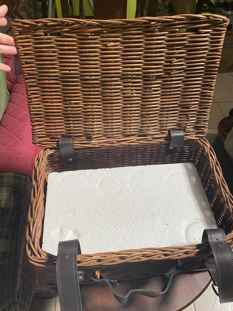Wicker Picnic Basket with Leather Straps (Category: Storage Boxes & Baskets) located in Quezon City. Submitted by maodg (Listing ID 1428456723, Image 2). Description: Description: Item was not actually used ( still with styrofoam inside) but kept only. Wicker picnic basket features a rectangular shape with a hinged lid. It has a sturdy handle and is secured with brown leather straps and metal buckles. Perfect for outdoor gatherings or as a decora