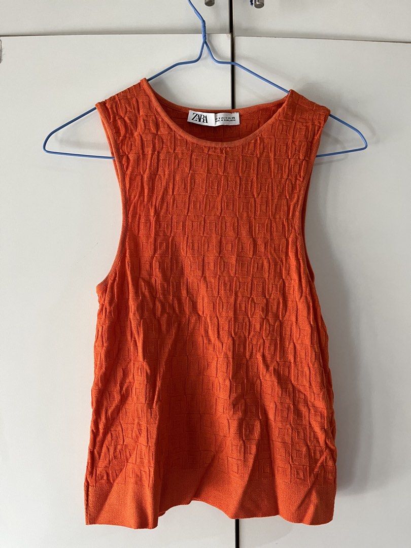Zara Orange Textured Tank Top (Category: Sleeveless) located in Makati City. Submitted by megsellsstuff (Listing ID 1428432519, Image 2). Description: nice for morena skin tone.