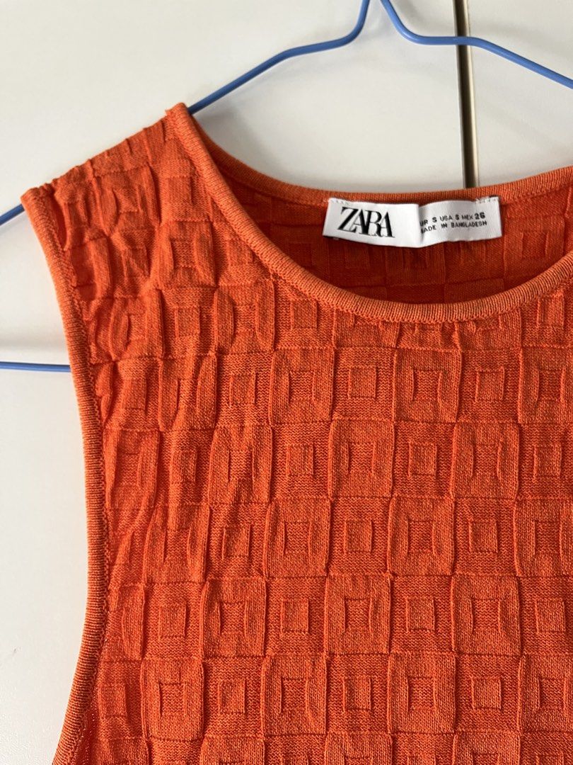 Zara Orange Textured Tank Top (Category: Sleeveless) located in Makati City. Submitted by megsellsstuff (Listing ID 1428432519, Image 1). Description: nice for morena skin tone.