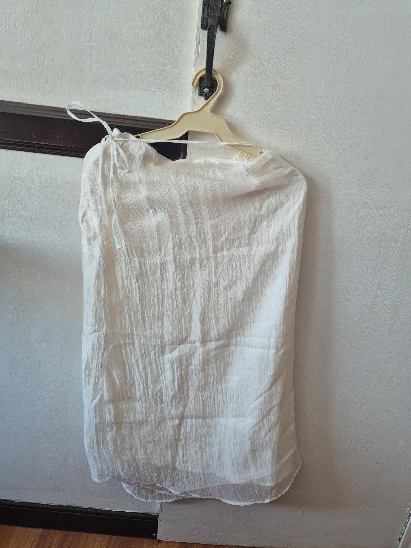 8 Seconds Wrap tie Skirt (Category: Skirts) located in Manila. Submitted by the_cabinetdeclutter (Listing ID 1428612274, Image 2). Description: -Size: Medium (Check photos for measurements. For reference, I have 27 waist) -Color: White -Wrap style skirt with zipper in the side -Has inner lining -Super ganda ng tela -Never been used. -Bought this for around 1k. Price is negotiable. -Also available in peach. Check other listing. (2 for 800).