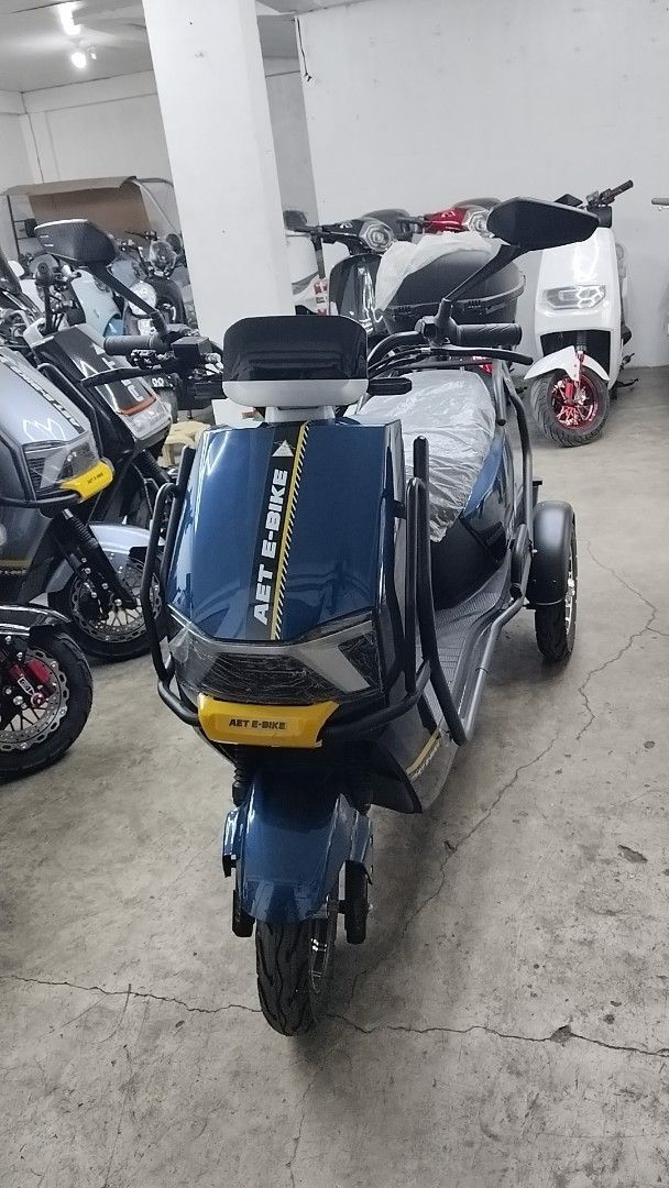 AET E-Bike Three-Wheeled Electric Scooter (Category: Skates, Rollerblades & Scooters) located in Antipolo. Submitted by mgrace0920 (Listing ID 1428776034, Image 1). Description: RESTOCKED‼️BEST SELLER MOTOR TYPE 3WHEELS NA PERFECT PARA SA MGA SENIOR OR PWD NATIN NA HIRAP OR TAKOT MAG BALANCE POWERED BY 2000WATTS NAAA‼️😱😍 👉SUPER 127B MOTOR TYPE 3WHEELS WITH CRASH GUARD ▪️₱3*,999👌 AVAILABLE COLOR 💙Blue 🖤Black 🤍White ✔️FREE HELMET ✔️FREE TOP 