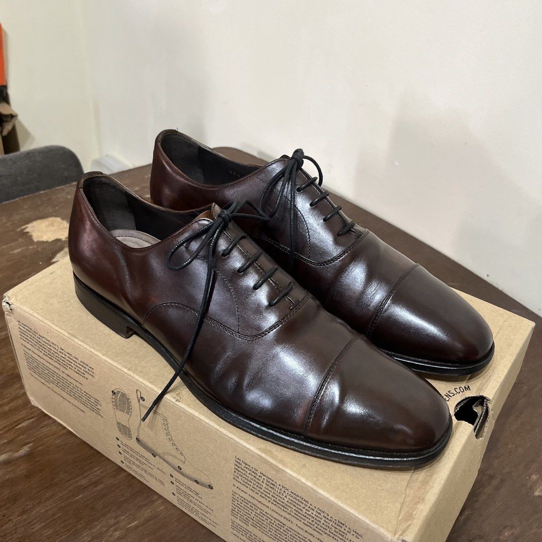 Authentic Prada Captoe Oxford Brown Leather shoes (Category: Dress Shoes) located in Muntinlupa City. Submitted by samurai_shine_allen (Listing ID 1428670156, Image 2). Description: Prada Captoe Oxford Dark Brown “9US” In Very Good Condition P5.2k only Details: - No issues regarding upper or sole - Original Leather Shoe - Hidden Stitched Outsole - Rich Dark Brown Shade.