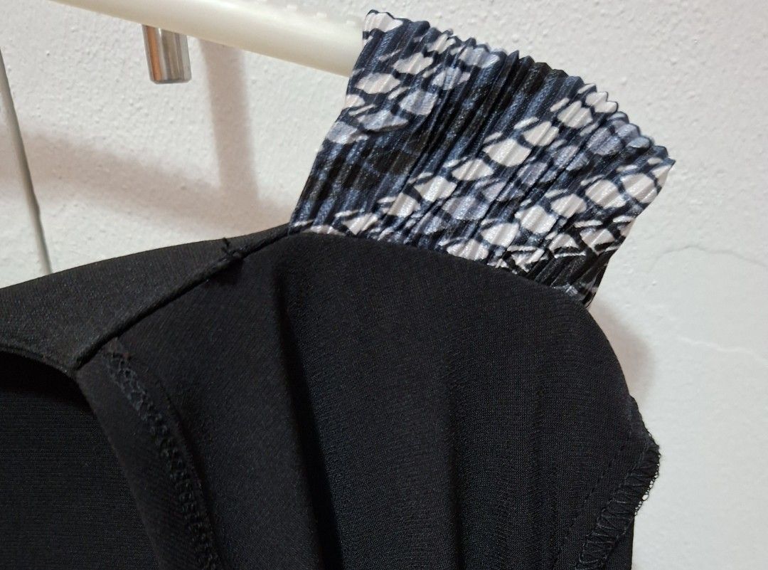 Black Dress with Cardigan (Category: Dresses) located in Quezon City. Submitted by ktin20 (Listing ID 1428711276, Image 3). Description: Elegant dress with inner sleeveless dress attached to the black long cardigan. The dress has a round neckline. The dress and cardigan are made of a smooth, likely lightweight fabric..