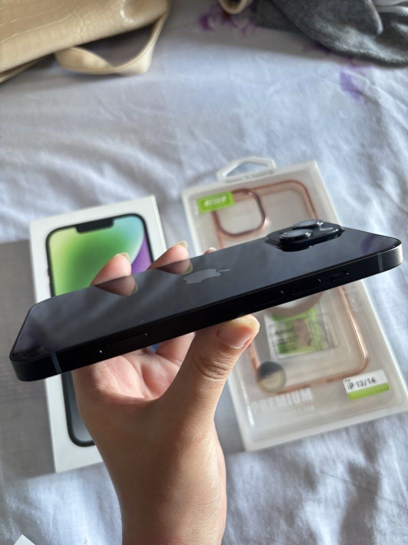 Brandnew iPhone 14 (Category: iPhone 14 Series) located in Caloocan City. Submitted by axxee (Listing ID 1428624573, Image 3). Description: - iPhone 14 midnight - Brandnew and original - Bought on March 22, 2026 - 128GB - With USB - C cable, box - With receipt - With screen protector already and a case Note: The unit is unsealed and opened at the store but never been used. Price: 32k MOP: Cash, Bank Transfer Meet up around Makati / Marilao Bulaca