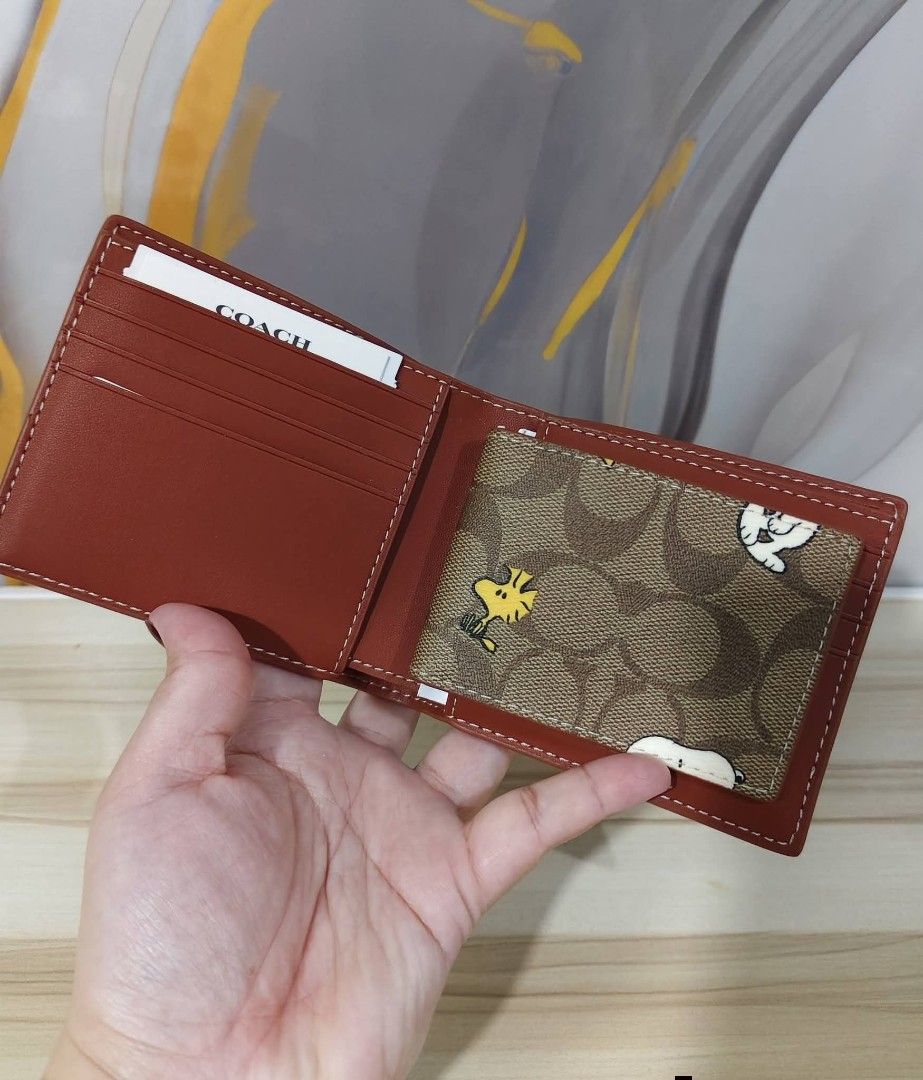 Coach Snoopy Wallet (Category: Luxury Bags & Wallets) located in Manila. Submitted by onlinebenta.ph (Listing ID 1428747646, Image 2). Description: ‼️ AVAILABLE ON HAND‼️ Coach X Peanuts 3-in-1 Wallet in Signature Canvas Brand New and Authentic Market Price: 9k to 12k My price: 6.5k Comes with tag and cc Guaranteed original Available shipping options Lalamove Can ship Nationwide COD with LBC.