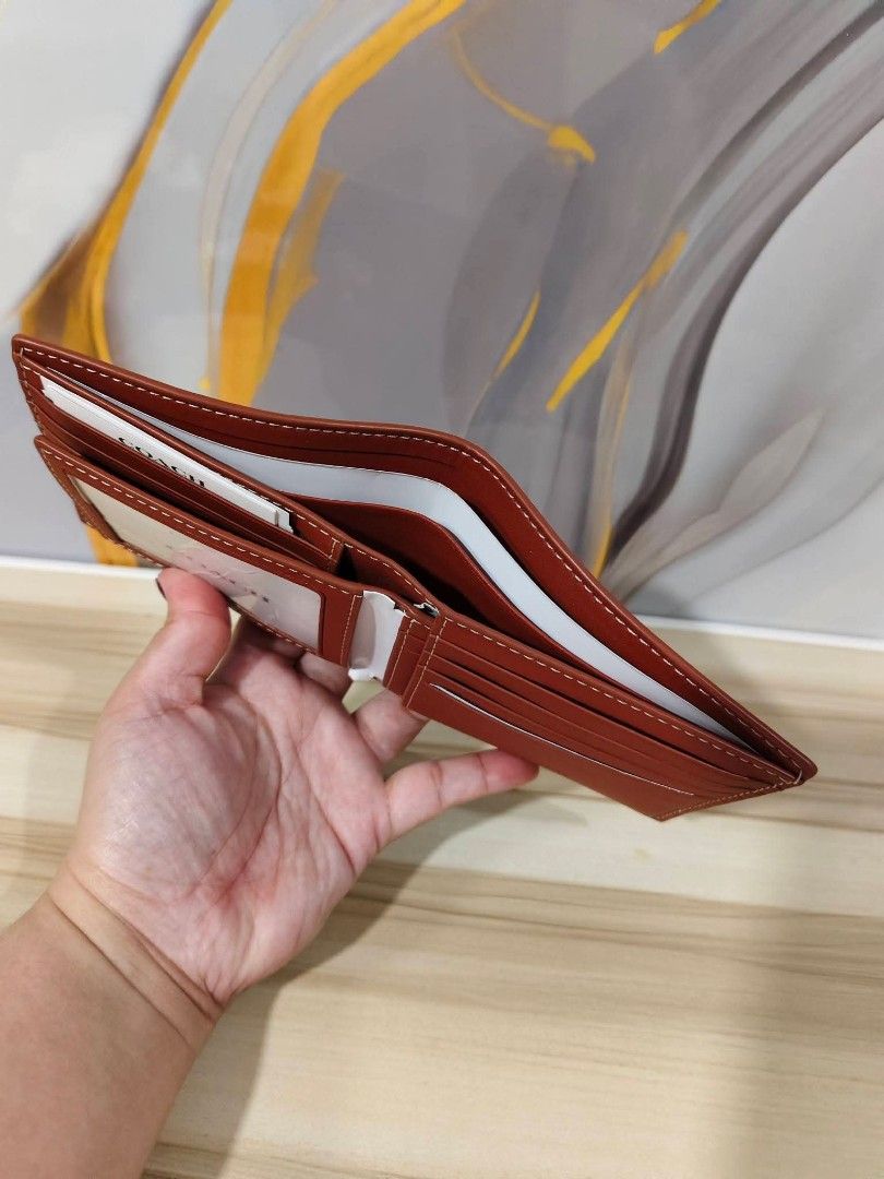 Coach Snoopy Wallet (Category: Luxury Bags & Wallets) located in Manila. Submitted by onlinebenta.ph (Listing ID 1428747646, Image 3). Description: ‼️ AVAILABLE ON HAND‼️ Coach X Peanuts 3-in-1 Wallet in Signature Canvas Brand New and Authentic Market Price: 9k to 12k My price: 6.5k Comes with tag and cc Guaranteed original Available shipping options Lalamove Can ship Nationwide COD with LBC.
