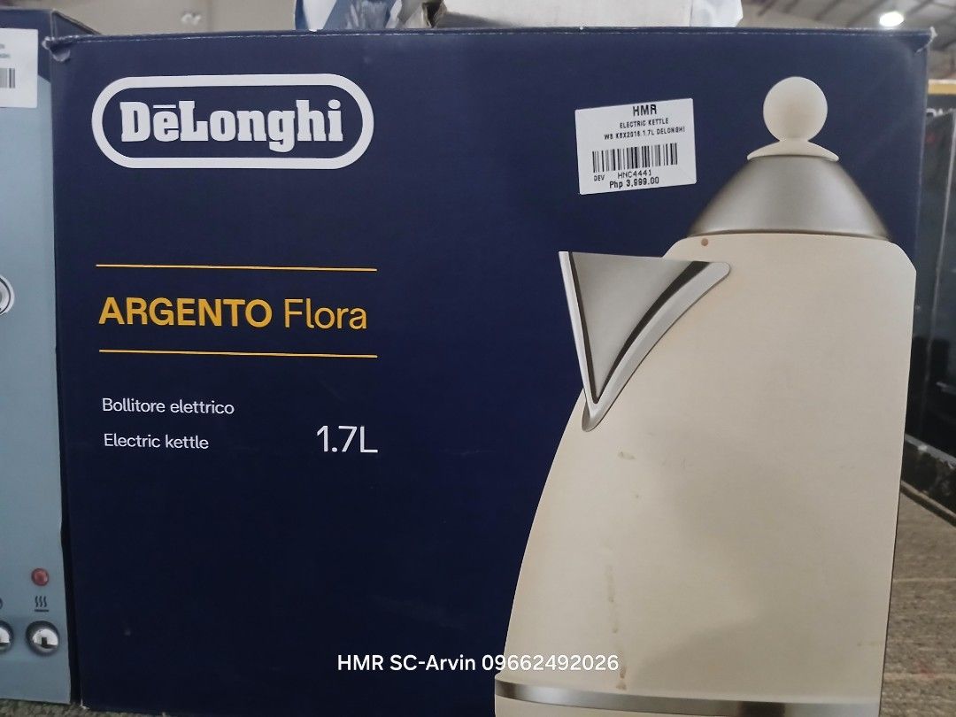 DeLonghi Argento Flora 1.7L Electric Kettle (Category: Kettles & Airpots) located in Manila. Submitted by sc_arvin (Listing ID 1428713379, Image 1). Description: DeLonghi Argento Flora electric kettle. It has a 1.7L capacity. The kettle is cream-colored with a silver top. The box shows the brand and model name. It is an electric kettle..