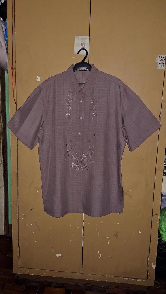 Embroidered Checkered Short Sleeve Shirt (Category: Formal Shirts) located in Quezon City. Submitted by dealmaker8 (Listing ID 1428635696, Image 1). Description: Short-sleeved shirt features a checkered pattern and embroidered details on the front. It has a button-down design and a classic collar. The color is a muted shade, possibly a dark color pink. It has a regular fit. Size width 24.5 length 31 pick up location QC near ateneo.