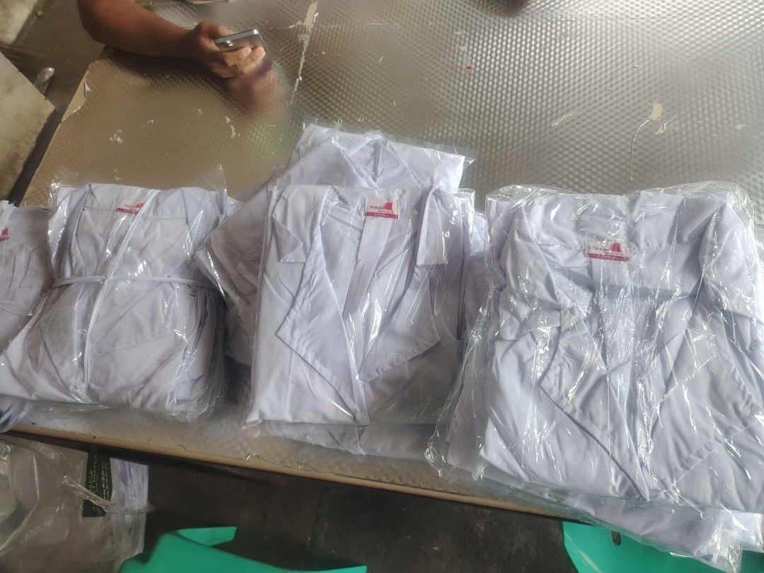 Firstaid Lab Coat - X-Small and Small (Category: Other Assistive Aids) located in Manila. Submitted by marino06 (Listing ID 1428702124, Image 2). Description: White lab coats from Firstaid. Available in X-Small and Small sizes. Each coat is individually packaged in plastic. The coats have a red label with the Firstaid logo and the words "Caring for Life"..