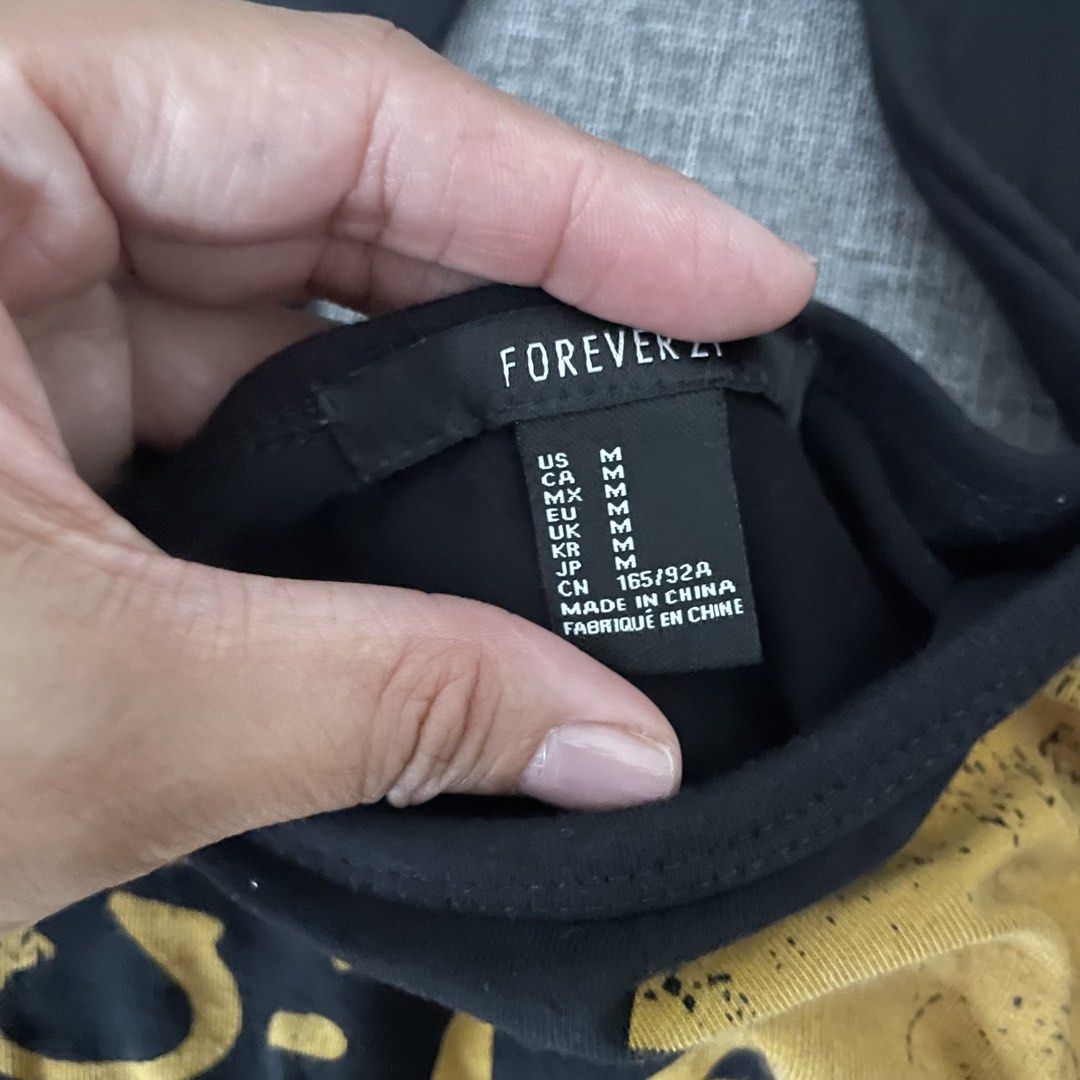 Forever 21 Crop Top Wu Tang (Category: Blouses) located in Paranaque City. Submitted by jntspns (Listing ID 1428657149, Image 2). Description: This is a preloved item. No issues RFS: decluttering.