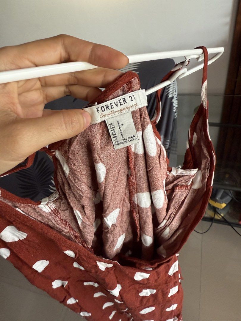 Forever 21 Polka Dot Wrap Dress (Category: Dresses) located in Marikina City. Submitted by declutter_keni24 (Listing ID 1428695407, Image 2). Description: Sewn the inner button.