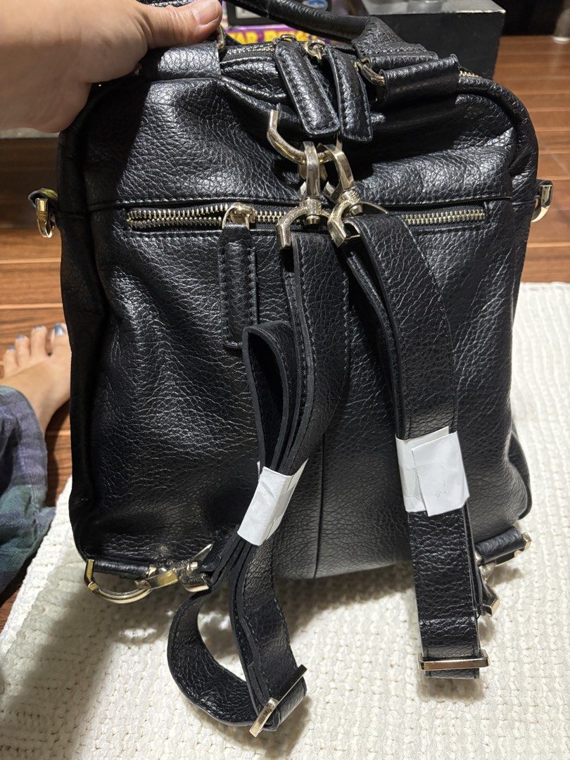 Givenchy Antigona Backpack (Category: Luxury Bags & Wallets) located in Bulacan. Submitted by love2loved (Listing ID 1428767810, Image 3). Description: Black Givenchy Antigona backpack. Features two front zip pockets, top handle, and adjustable shoulder straps. The interior has a Givenchy label. The bag has gold-tone hardware. The back of the bag has a zip pocket. The bag can be converted into a shoulder bag. Good condition Signs of wear Maganda 