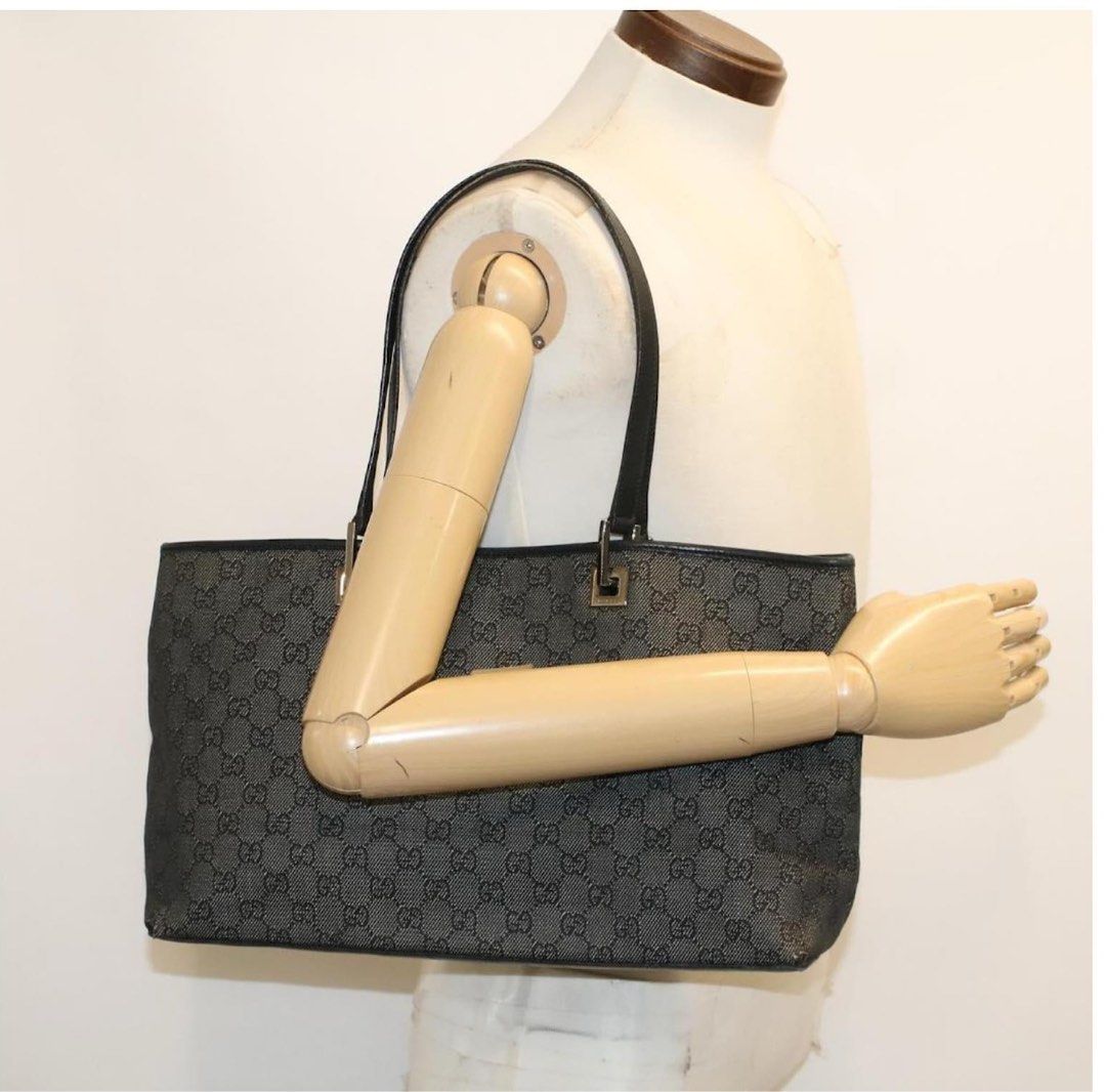 Gucci GG Canvas Tote Bag (Category: Luxury Bags & Wallets) located in Carmona. Submitted by MarielleAG (Listing ID 1428657749, Image 2). Description: *Gucci Vintage GG Monogram Tote – Black Canvas in East-West Style* 🖤 Understated and classic Gucci piece ✔️ Signature GG monogram canvas ✔️ Slim and lightweight – easy everyday carry ✔️ Minimalist, quiet luxury vibe Condition: Good vintage condition – bought this preowned to match my Gucci espadril