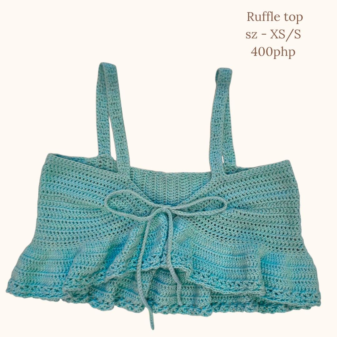 Handmade Crochet Ruffle Top Blue Size Small (Category: Sleeveless) located in Manila. Submitted by flashylanding (Listing ID 1426483195, Image 1). Description: Crochet ruffle top blue Width - 15 inches Length - 7.5 inches sf shouldered by the buyer.