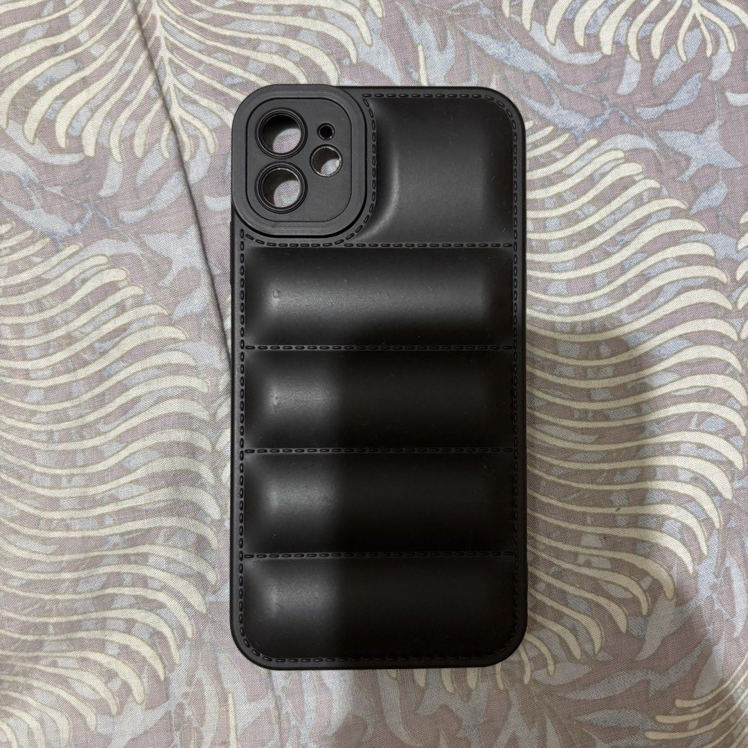 iPhone 11 Puffer Case Black (Category: Cases & Sleeves) located in Binan City. Submitted by declutterwithpea (Listing ID 1428707956, Image 1). Description: ♡ rfs : not using anymore ♡ mop: gcash / bdo bank transfer ♡orig price: 100 php.