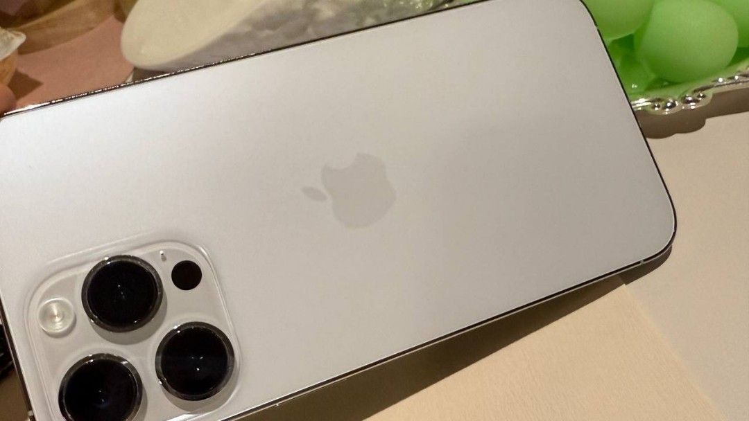 iPhone 14 Pro Max — 1TB (Category: iPhone 14 Series) located in Taguig. Submitted by ohhhs (Listing ID 1428724339, Image 2). Description: 📱 iPhone 14 Pro Max — 1TB Version • Model: MQ833Z/A (Common model in Middle East/Hong Kong versions) • Capacity: 1.02 TB (Top-of-the-line) • Battery Health: 89% • Appearance: Virtually undamaged, glossy silver frame • Screen: No cracks • Account unlocked, normal use.